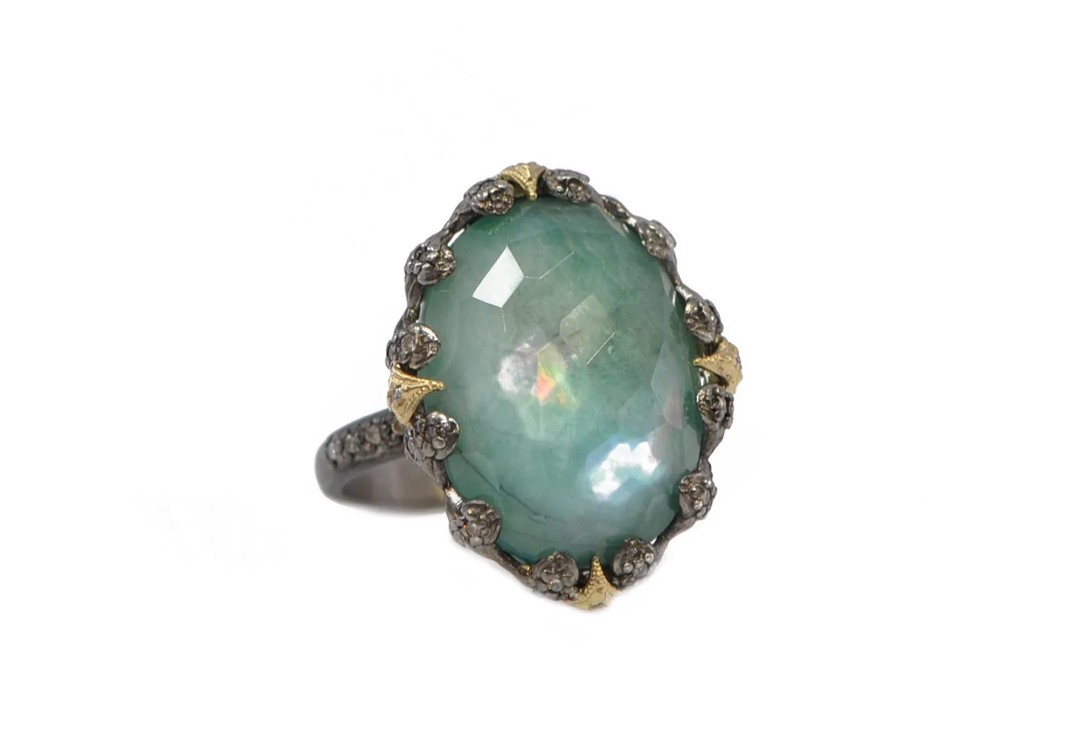 OVAL EMERALD AND CRIVELLI STATEMENT RING