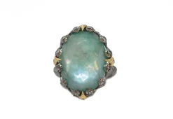 OVAL EMERALD AND CRIVELLI STATEMENT RING