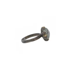 OVAL EMERALD AND CRIVELLI STATEMENT RING