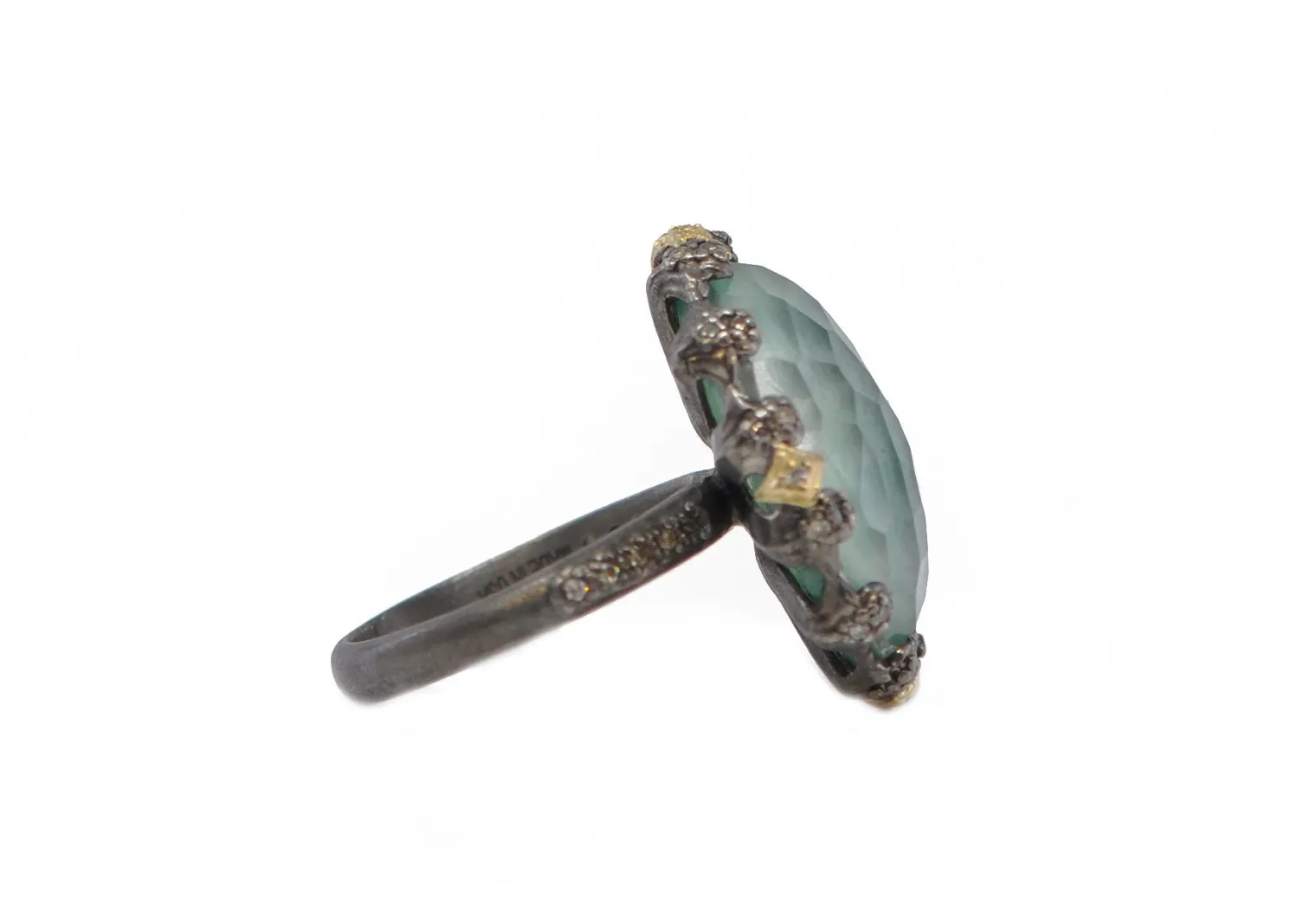 OVAL EMERALD AND CRIVELLI STATEMENT RING