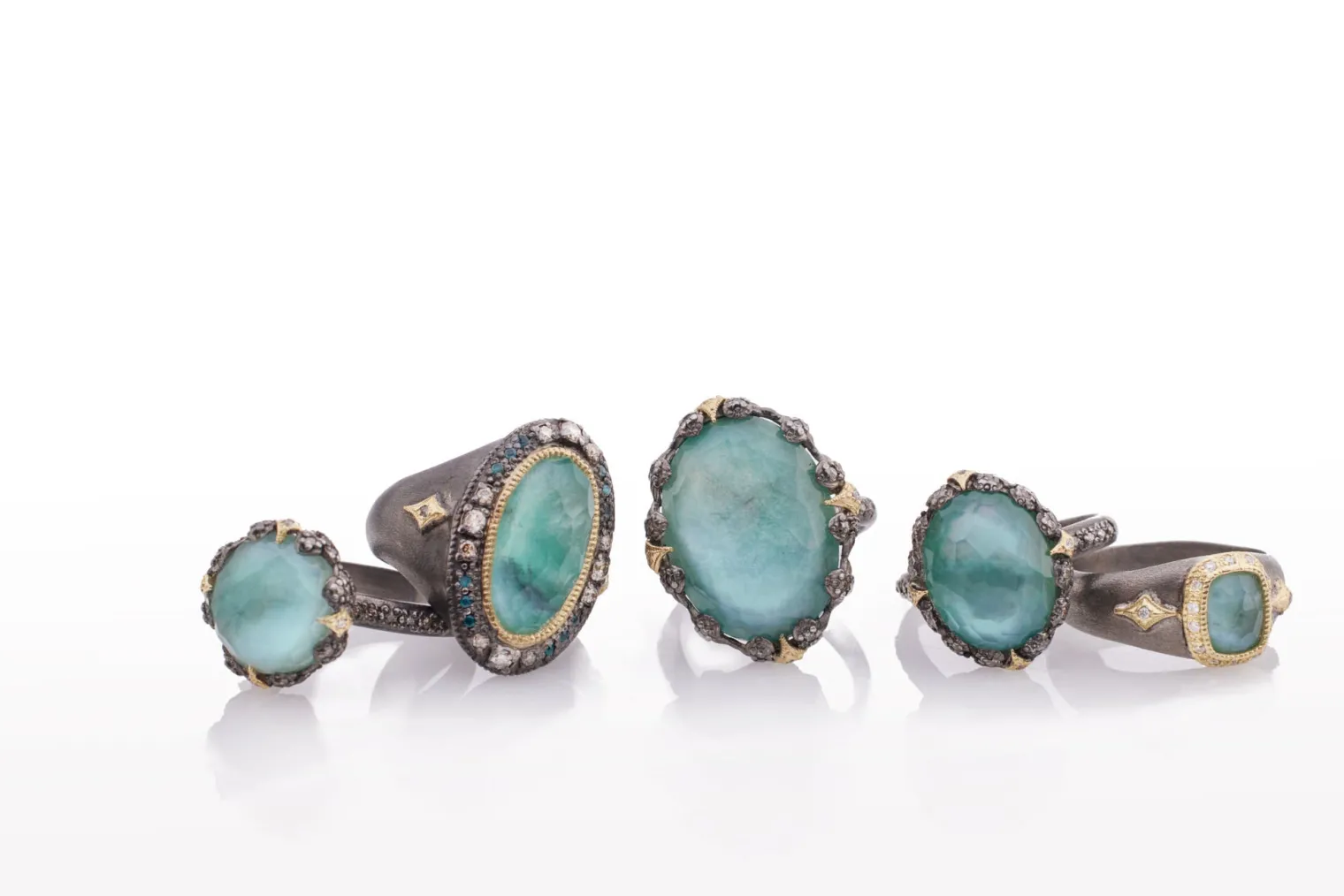 OVAL EMERALD AND CRIVELLI STATEMENT RING