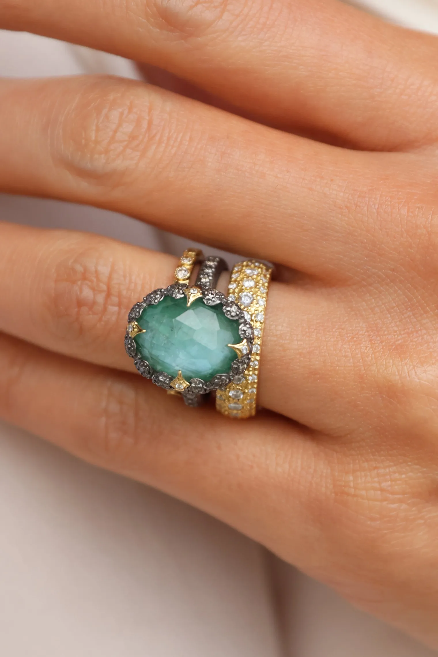 OVAL EMERALD AND CRIVELLI STATEMENT RING